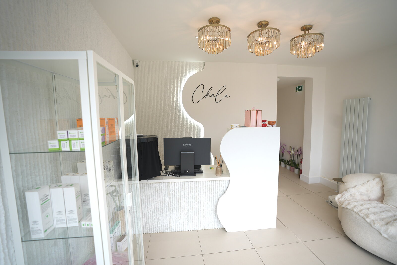 CHALA Clinic reception with crystal chandeliers and elegant interior